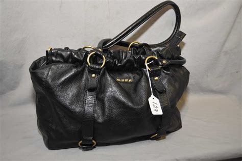 miu miu vintage leather bag|second hand miu mius.